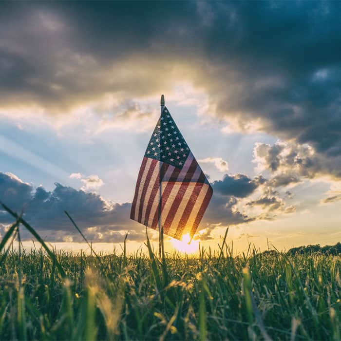 american flag in a field